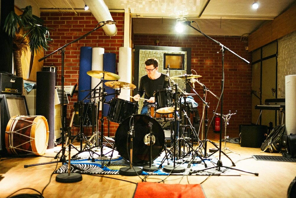 student playing drums at trixx studio