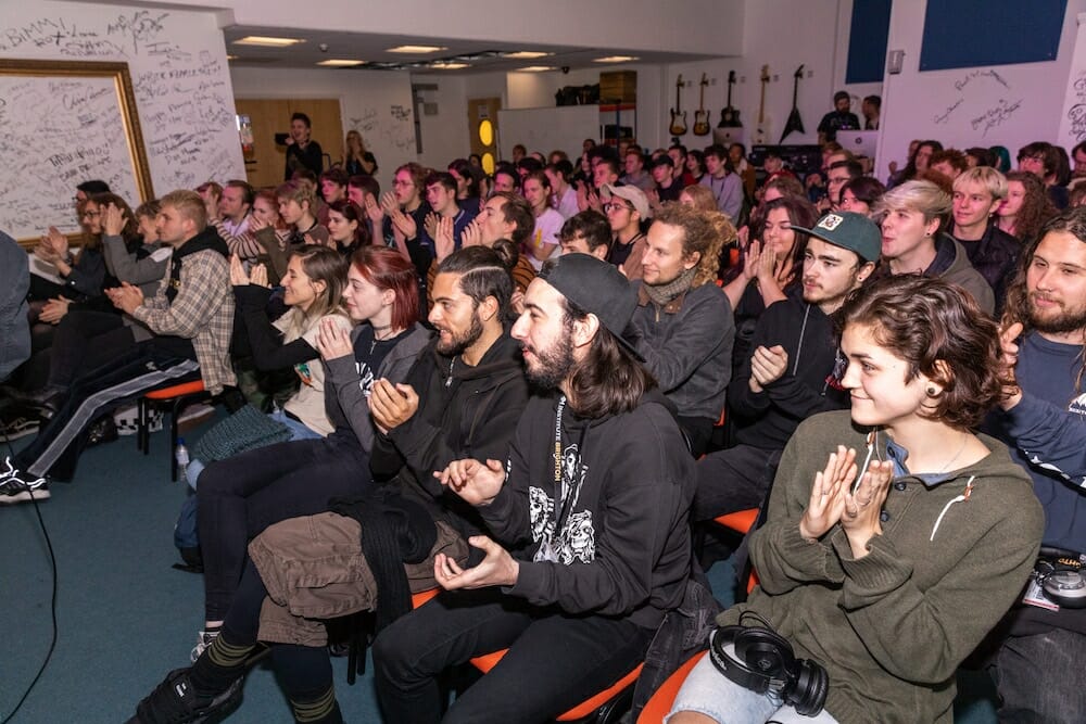 BIMM Dublin IDLES Masterclass - wide shot of many students seated and clapping