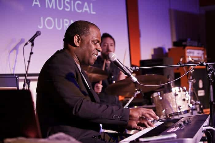 Morris Pleasure using a keyboard at an event