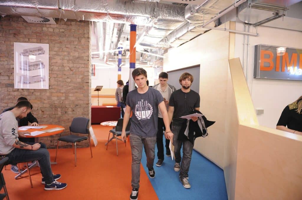 BIMM Manchester with students walking inside