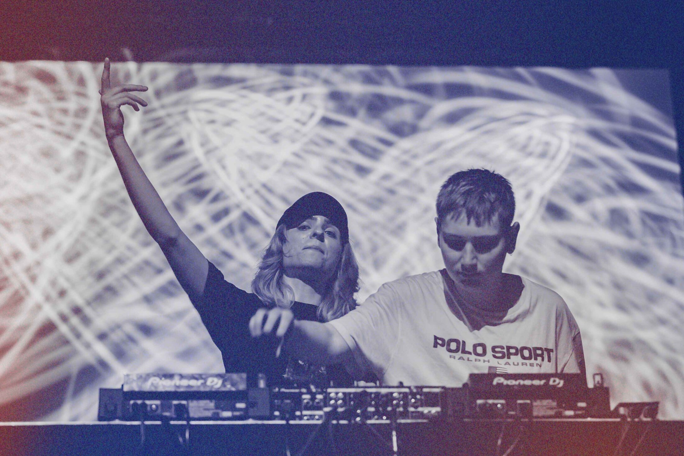 Two DJs performing a set