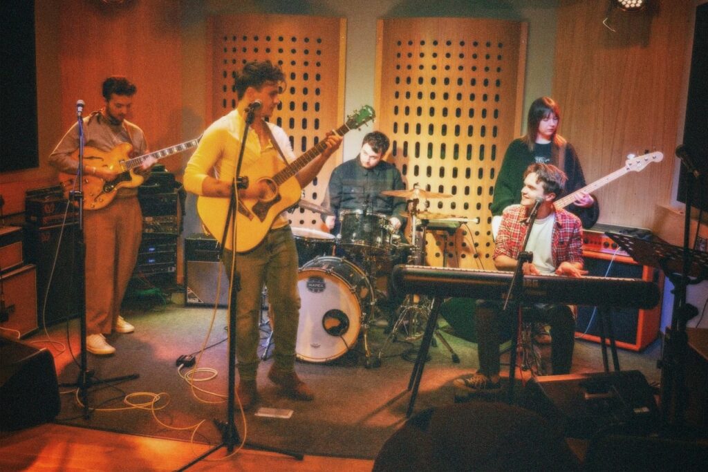 Wooden Dog on stage performing